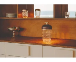 Discover the dark wood and crystal portable lamp by Saint-Louis